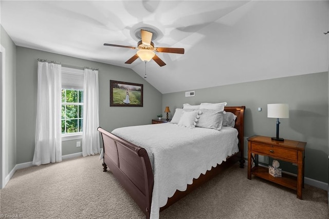 8483 Austin Hill Ln, Tobaccoville, NC 27050 - bedroom with light carpet, vaulted ceiling, and ceiling fan