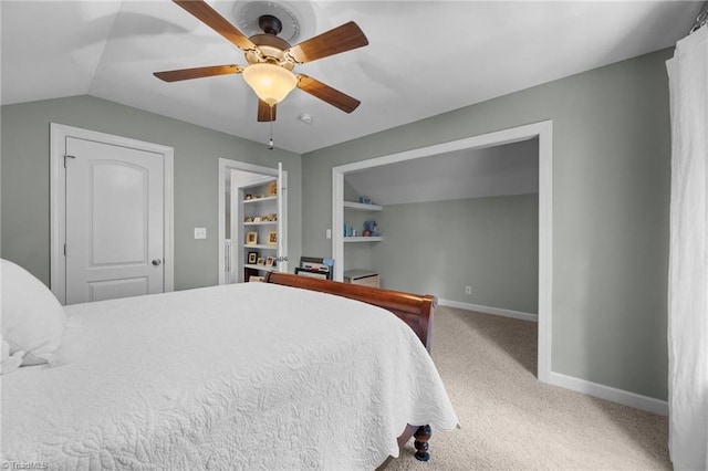 8483 Austin Hill Ln, Tobaccoville, NC 27050 - bedroom with vaulted ceiling, carpet, and ceiling fan