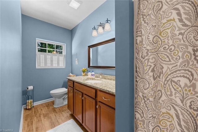 8483 Austin Hill Ln, Tobaccoville, NC 27050 - full bath with wood finished floors and vanity