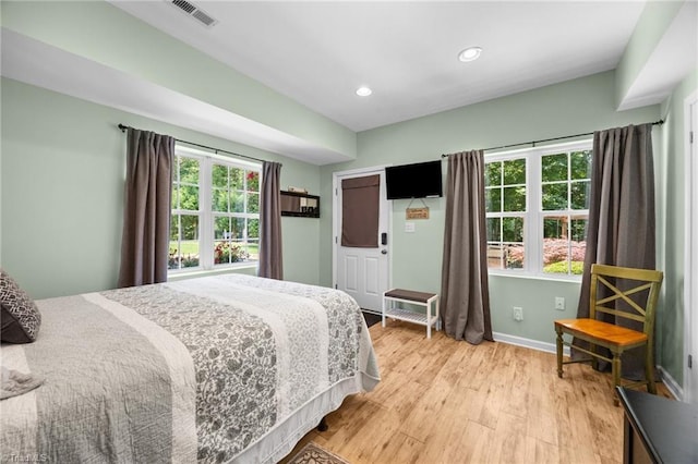 8483 Austin Hill Ln, Tobaccoville, NC 27050 - bedroom with light wood-style floors and recessed lighting