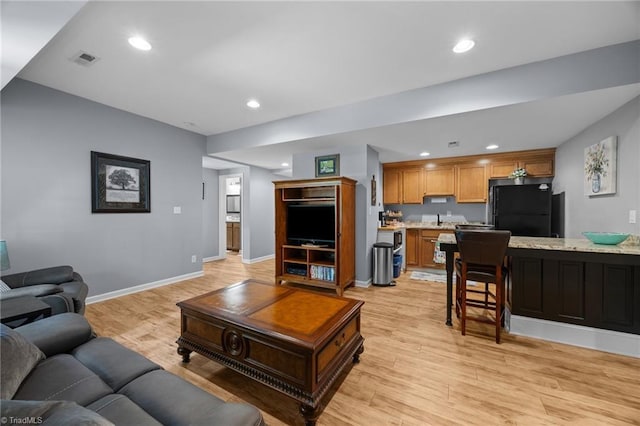 8483 Austin Hill Ln, Tobaccoville, NC 27050 - living room with light wood-type flooring and recessed lighting