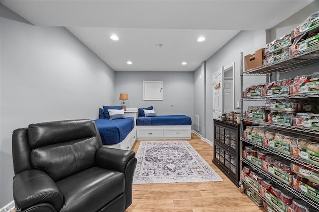 8483 Austin Hill Ln, Tobaccoville, NC 27050 - bedroom featuring light wood finished floors and recessed lighting