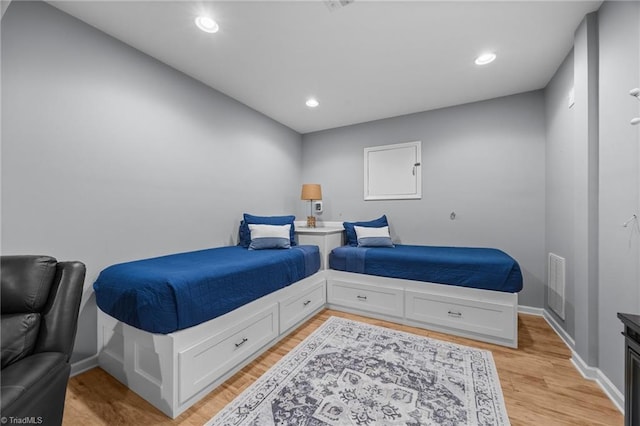 8483 Austin Hill Ln, Tobaccoville, NC 27050 - bedroom with light wood-type flooring and recessed lighting