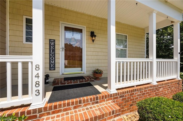 8483 Austin Hill Ln, Tobaccoville, NC 27050 - property entrance with a porch