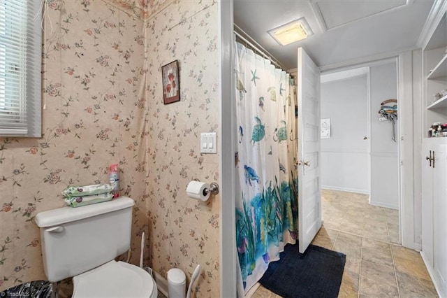 bathroom with toilet and walk in shower