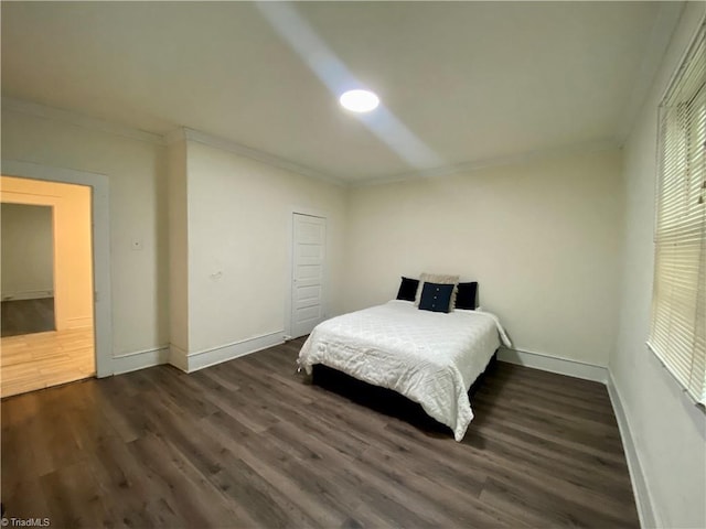 1415 E 4th St, Winston-Salem, NC 27101 - bedroom with ornamental molding and wood finished floors