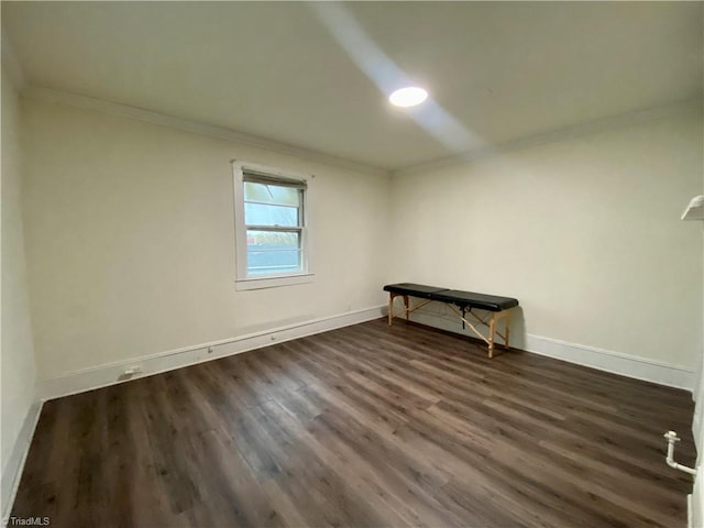 1415 E 4th St, Winston-Salem, NC 27101 - unfurnished room featuring crown molding and dark wood-style flooring