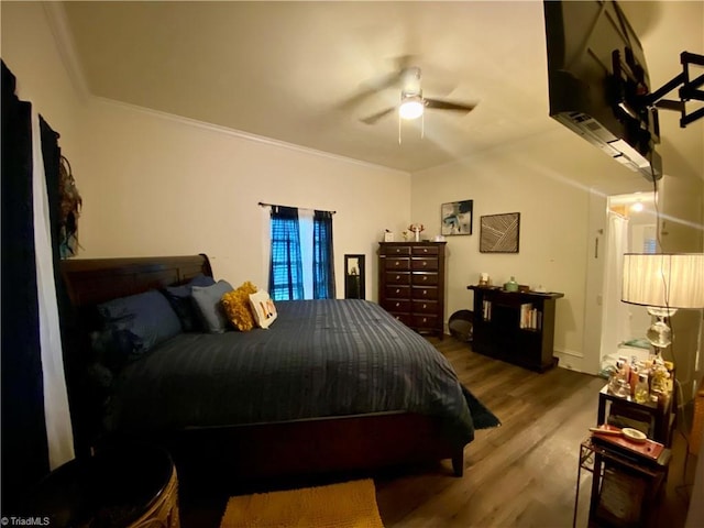 1415 E 4th St, Winston-Salem, NC 27101 - bedroom featuring wood finished floors, crown molding, and a ceiling fan