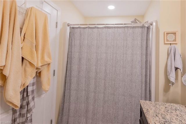 bathroom with vanity, recessed lighting, and a shower with shower curtain
