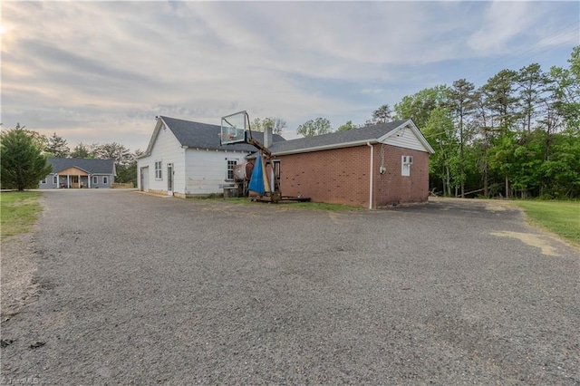 view of home's exterior with brick siding