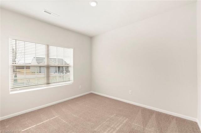 1047 Russell Dr, Winston-Salem, NC 27127 - carpeted empty room featuring baseboards and visible vents