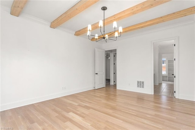 unfurnished room with a chandelier, wood finished floors, visible vents, baseboards, and beamed ceiling