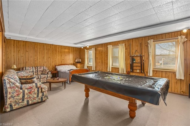 playroom featuring carpet, wood walls, and pool table