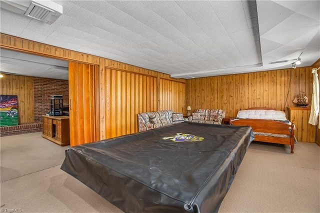 recreation room with billiards, carpet, visible vents, and wood walls