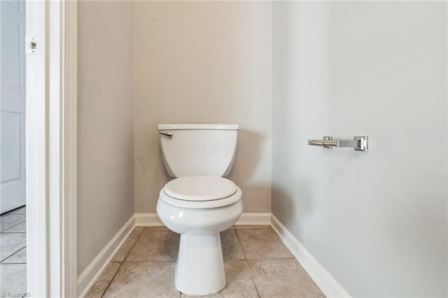 bathroom featuring tile patterned floors and toilet