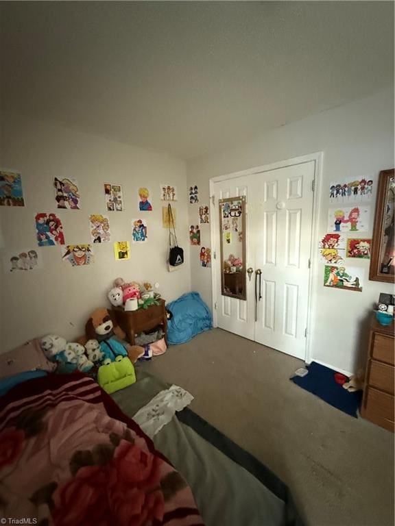 bedroom featuring carpet flooring