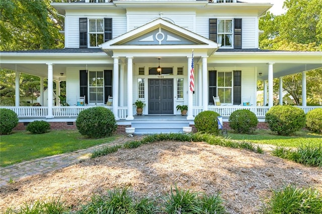 view of front of property featuring covered porch