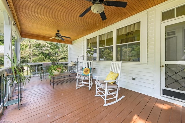 deck featuring ceiling fan and a porch