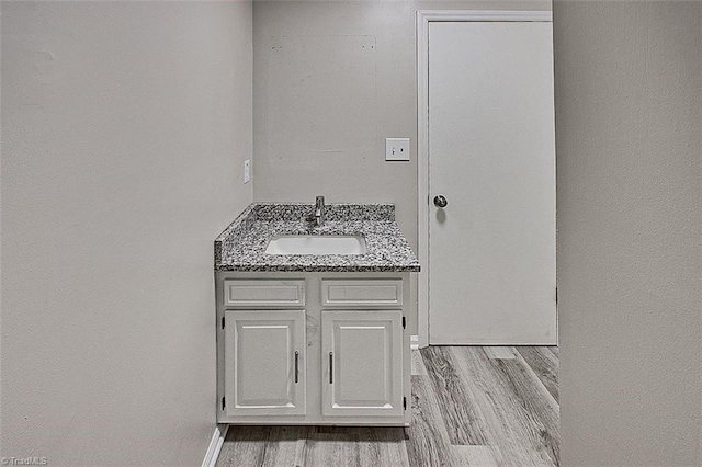 5948 Muddy Creek Rd, Archdale, NC 27263 - bathroom with wood finished floors and vanity