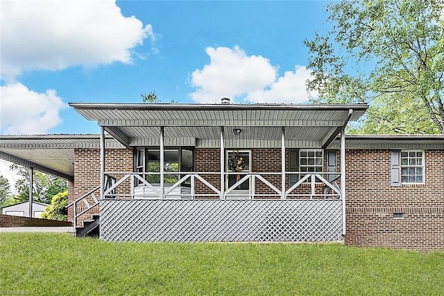 5948 Muddy Creek Rd, Archdale, NC 27263 - back of property with brick siding, a yard, crawl space, and a porch