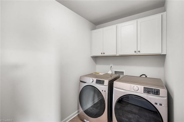 635 Cam Cir, High Point, NC 27265 - washroom featuring cabinet space, washer and clothes dryer, and baseboards