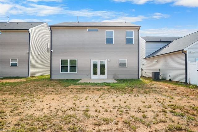 635 Cam Cir, High Point, NC 27265 - rear view of property with a patio, french doors, central air condition unit, and a lawn