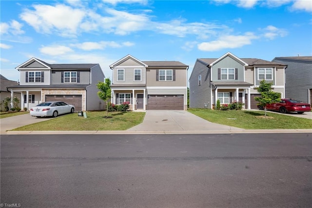 635 Cam Cir, High Point, NC 27265 - traditional-style home featuring concrete driveway, an attached garage, and a front lawn