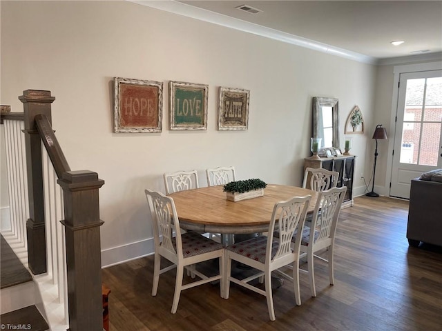 dining room featuring dark hardwood / wood-style flooring