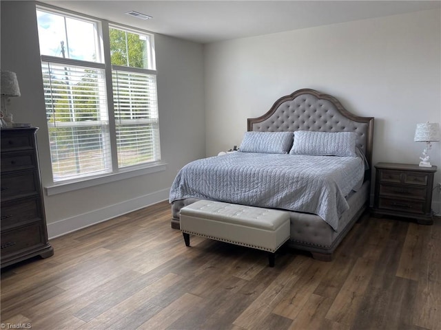 bedroom featuring dark hardwood / wood-style floors