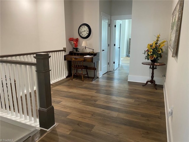 hall featuring dark wood-type flooring