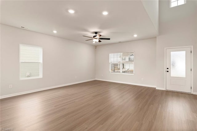 239 Dixieland Ct, King, NC 27021 - unfurnished living room featuring ceiling fan, recessed lighting, and dark wood-type flooring