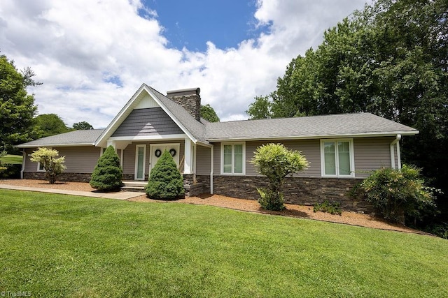123 Greenbriar St, Mount Airy, NC 27030 - view of front of property featuring a chimney, a front yard, stone siding, and a shingled roof