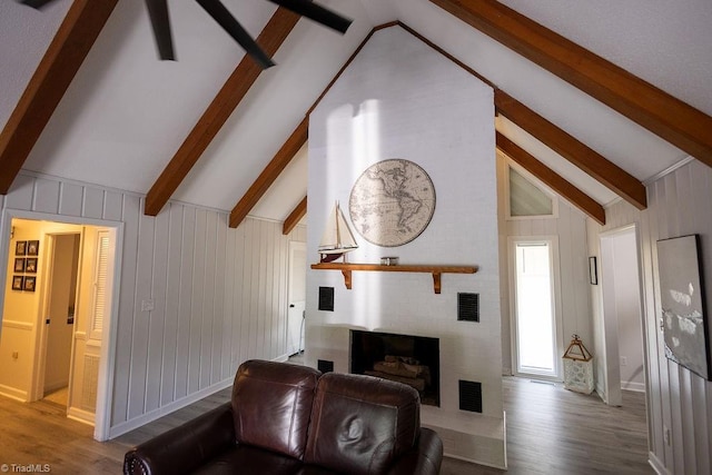123 Greenbriar St, Mount Airy, NC 27030 - living room featuring wood finished floors and a brick fireplace