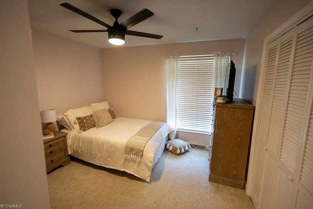 123 Greenbriar St, Mount Airy, NC 27030 - bedroom featuring light colored carpet, a closet, and a ceiling fan