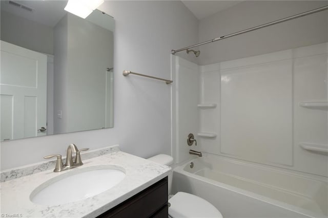 full bathroom with vanity, toilet, and shower / washtub combination