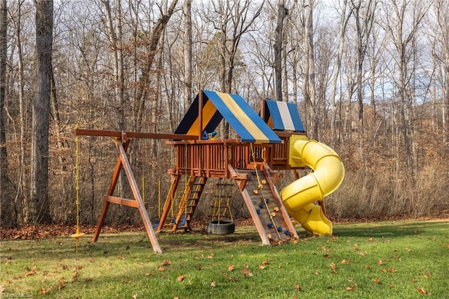 view of jungle gym featuring a lawn