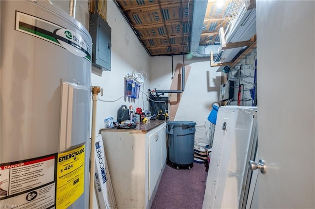 utility room featuring water heater and electric panel