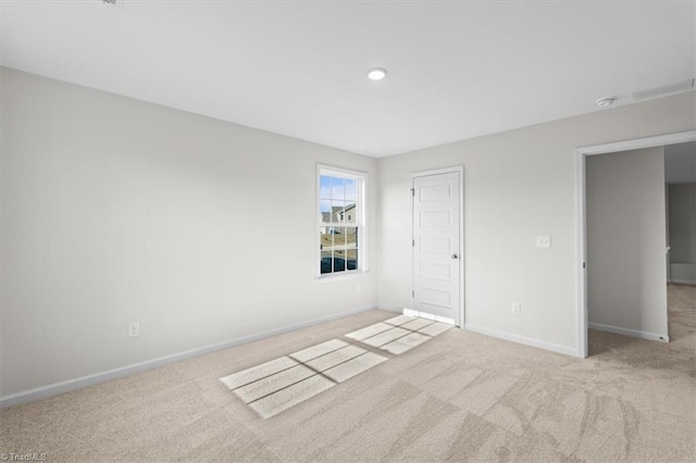 unfurnished bedroom with light carpet