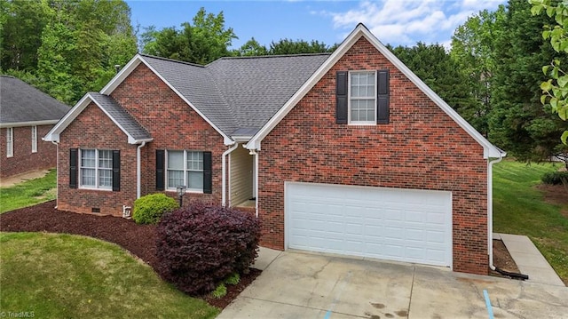 traditional home with a front yard, brick siding, a shingled roof, concrete driveway, and an attached garage