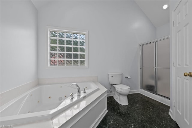 bathroom featuring toilet, a tub with jets, lofted ceiling, and a stall shower