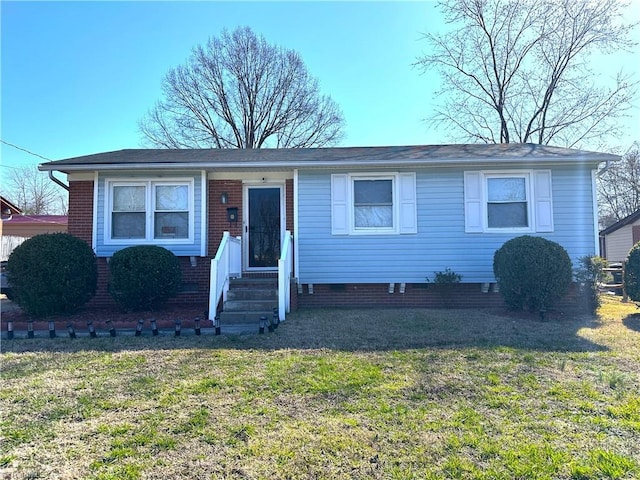 view of front of house featuring a front yard and crawl space