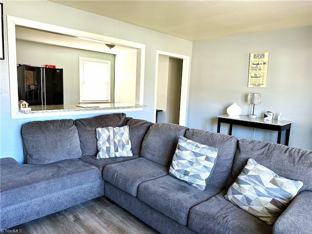 living room with wood finished floors