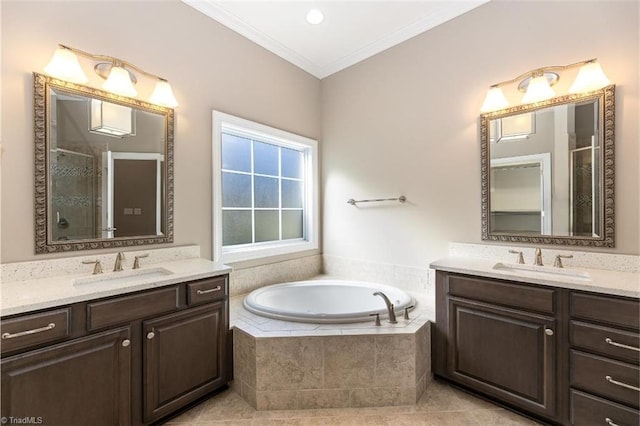 bathroom featuring a sink, a bath, tile patterned flooring, and crown molding