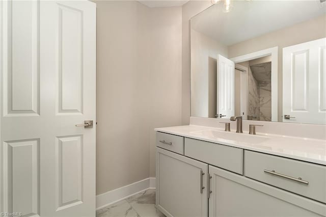 bathroom featuring vanity and tile floors