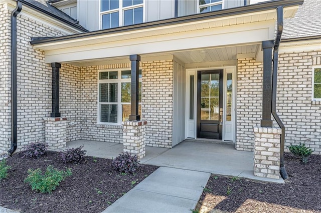 doorway to property featuring a porch