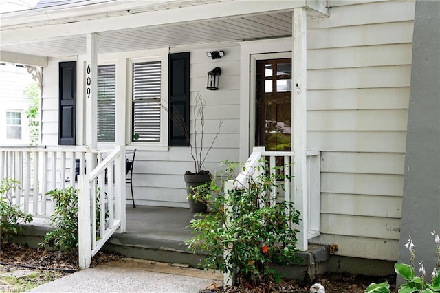 609 W Lexington Ave, High Point, NC 27262 - view of exterior entry featuring covered porch