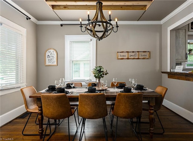 609 W Lexington Ave, High Point, NC 27262 - dining room with a chandelier, dark wood finished floors, healthy amount of natural light, and crown molding