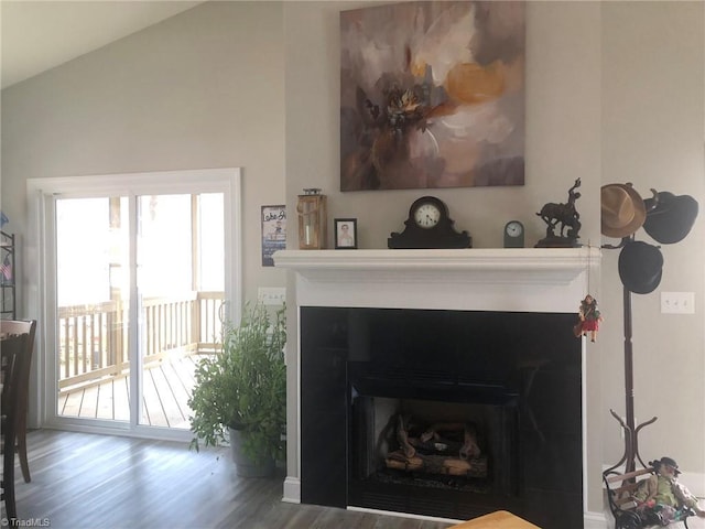 room details with a fireplace and wood finished floors