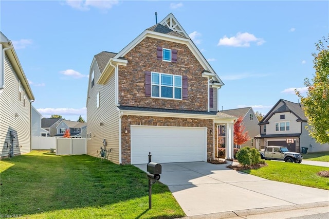 view of front of house featuring a front yard and a garage