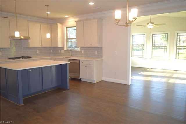 kitchen with black stovetop, light countertops, backsplash, under cabinet range hood, and stainless steel dishwasher